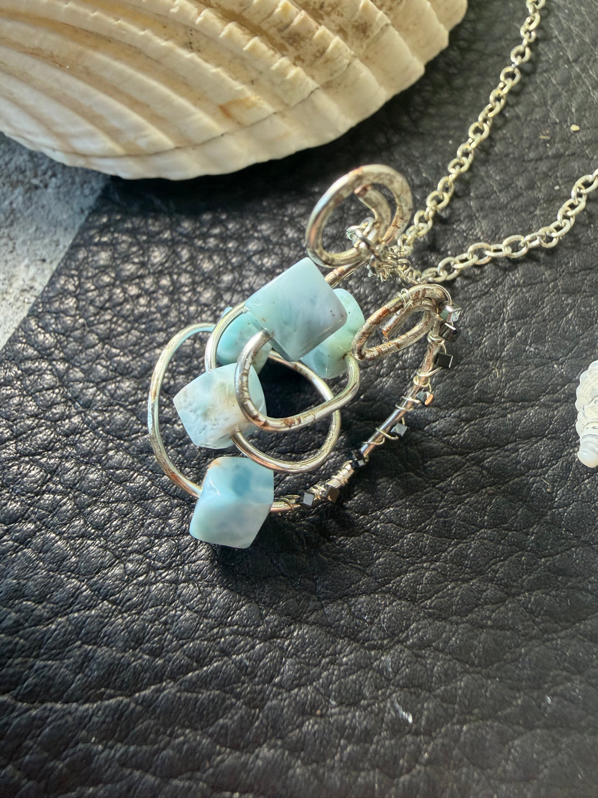 Caribbean Cool – Hand-Forged Silver Larimar Whirlpool & Black Diamond Pendant