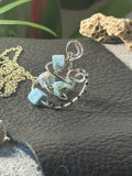 Caribbean Cool – Hand-Forged Silver Larimar Whirlpool & Black Diamond Pendant